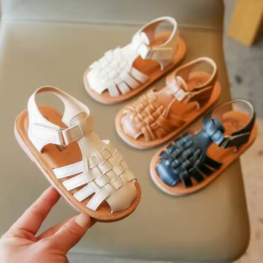 Flat fashion kids sandals in solid colors with adjustable straps, perfect for summer wear.
