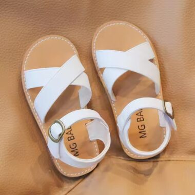 Solid color classic casual kids sandals with adjustable straps and breathable design for summer.